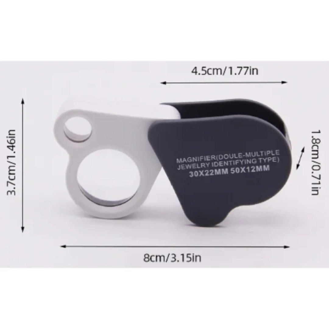 Lupa de joyero plegable con dos lentes de aumento: 30×22 mm y 50×12 mm. Para joyería, gemología, relojería y observación de detalles pequeños.
